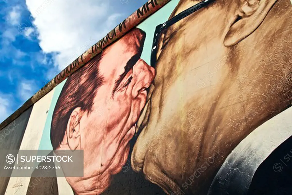 Berlin, Germany, Berlin Wall, East Side Gallery Friedrichshain, Detail of the painting by Russian artist Dimitry Vrubel of Brezhnev kissing Honecker