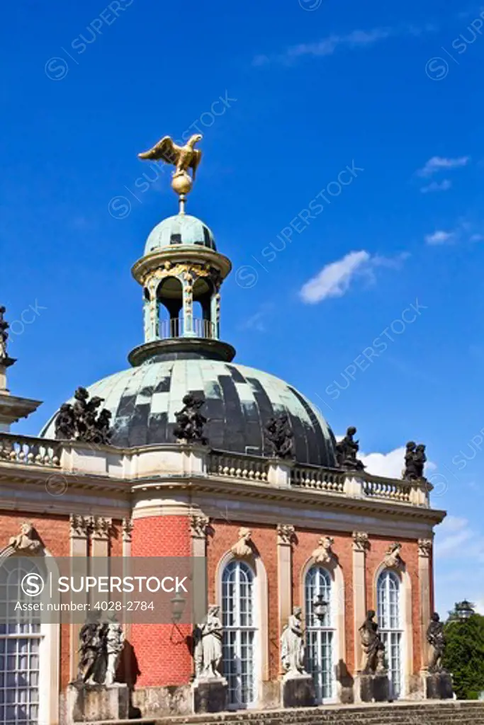 Potsdam, Brandenburg, Germany, The baroque New Palace (Neues Palais) in the  Sans Souci Park,  adorned with statues and sculptures.