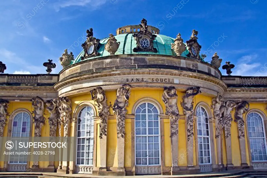Germany, Brandenburg, Preussen, Potsdam, close up of the main facade of Sans Souci Palace with statues of Atlas and Caryatids.
