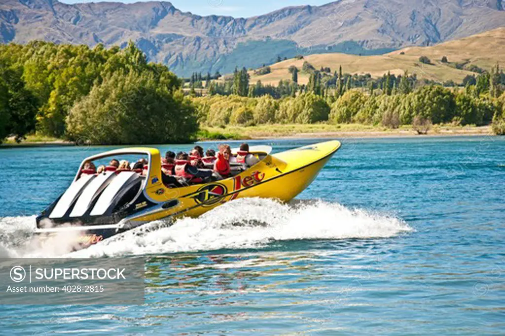 New Zealand, South Island, Clutha-Central Otago, Queenstown, thrill seeker waves on jet boat on Shotover River and Shotover Canyons