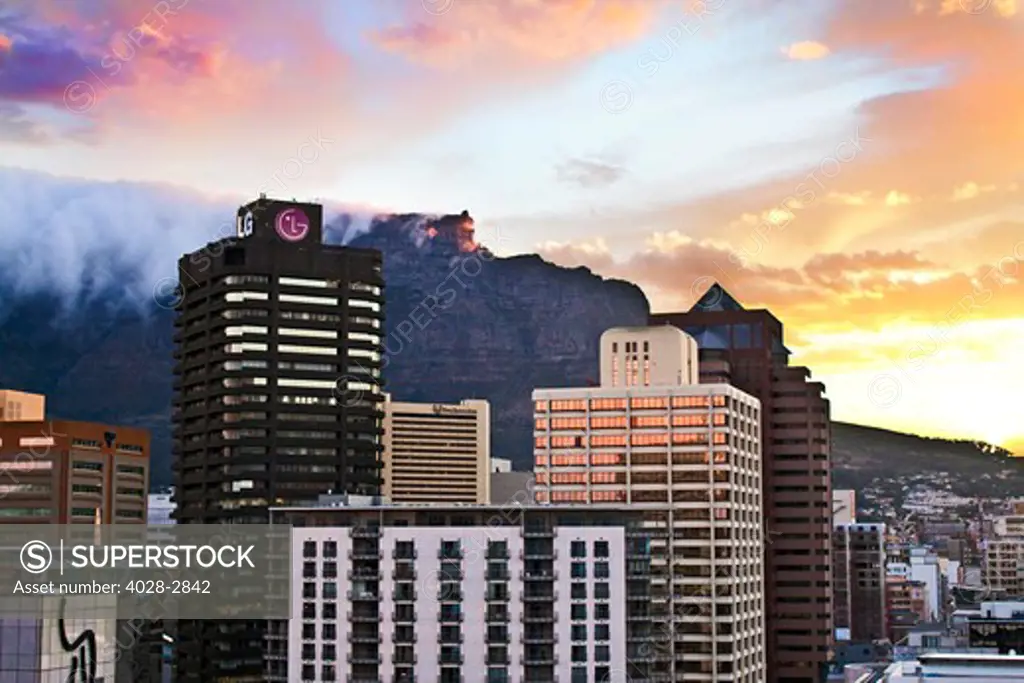 Cape Town, Western Cape, South Africa, view of downtown skyscrapers, City Bowl and Table Mountain at sunset.