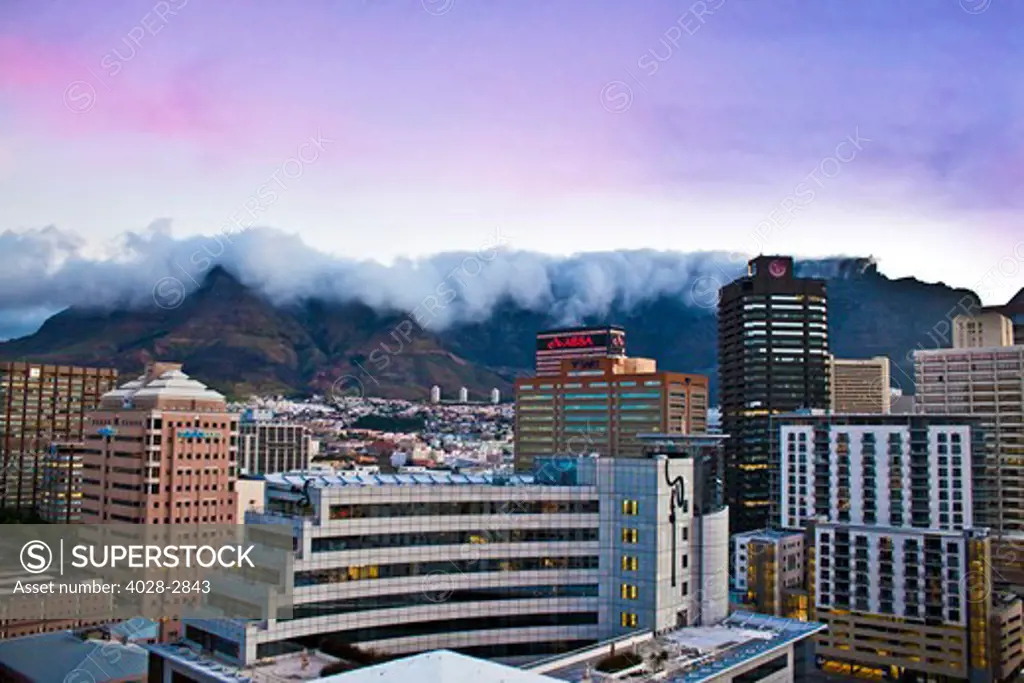 Cape Town, Western Cape, South Africa, view of downtown skyscrapers, City Bowl and Table Mountain at sunset.