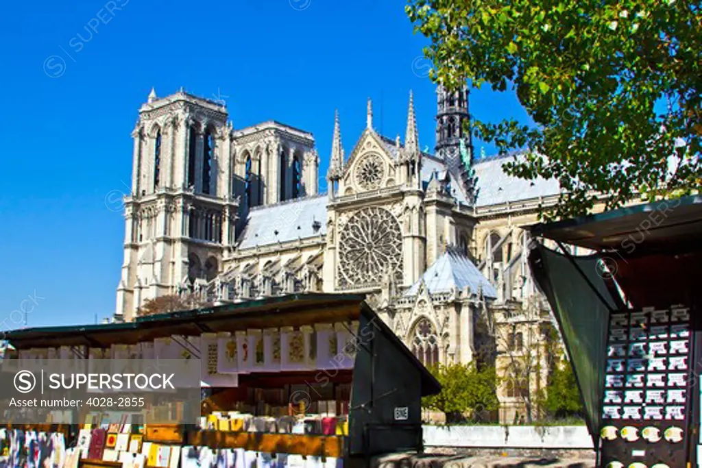 Paris, France, ile De La Cite, kiosks in front of the facade of Notre Dame Cathedral across the Seine River