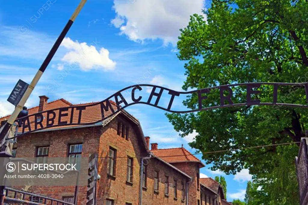 Entrance to the Nazi Concentration Camp in Auschwitz, Poland, under the sign Arbeit Macht Frei (Work will set you free).