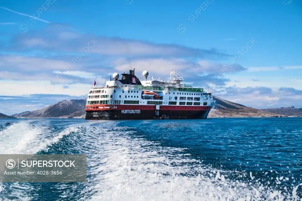 Iceland, Snaefellsnes Peninsula, Ms Fram Hurtigruten cruise ship sails near the montains, cliffs and coastline of Iceland