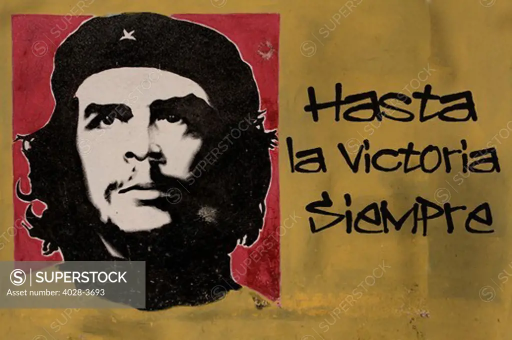 Cuba, Havana, stenciled painting of Che Guevara, garaffiti on a building, Hasta la victoria siempre (always towards victory)