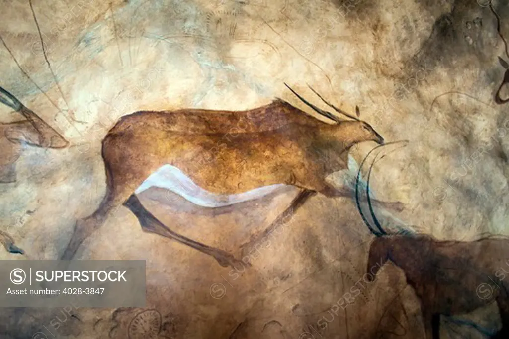 Tanzania, Ngorongoro Crater, artwork meant to look like primitive cave paintings on the stone walls of the Ngorongoro Serena Safari Lodge