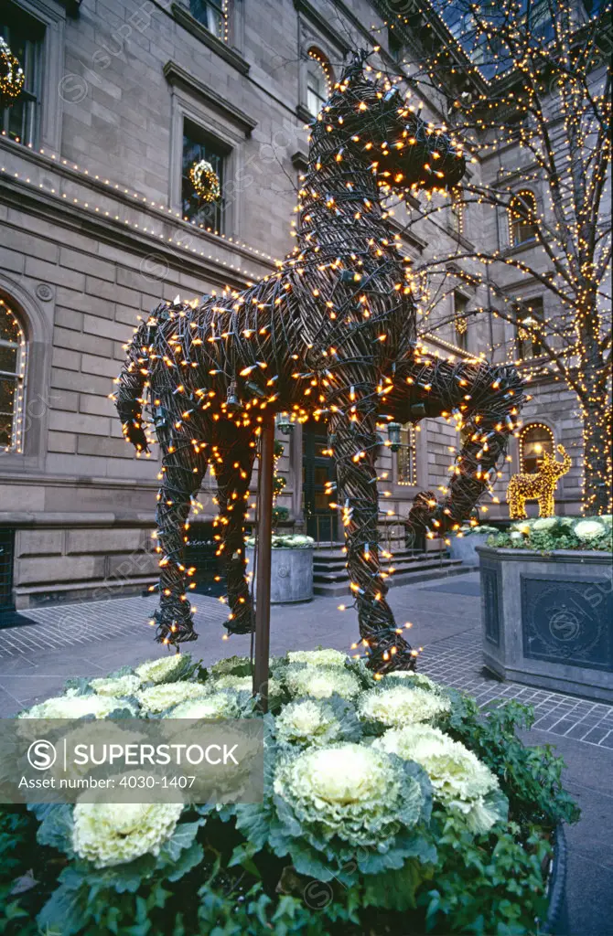 Statue Decorated with Lights on Madison Avenue, New York, North America