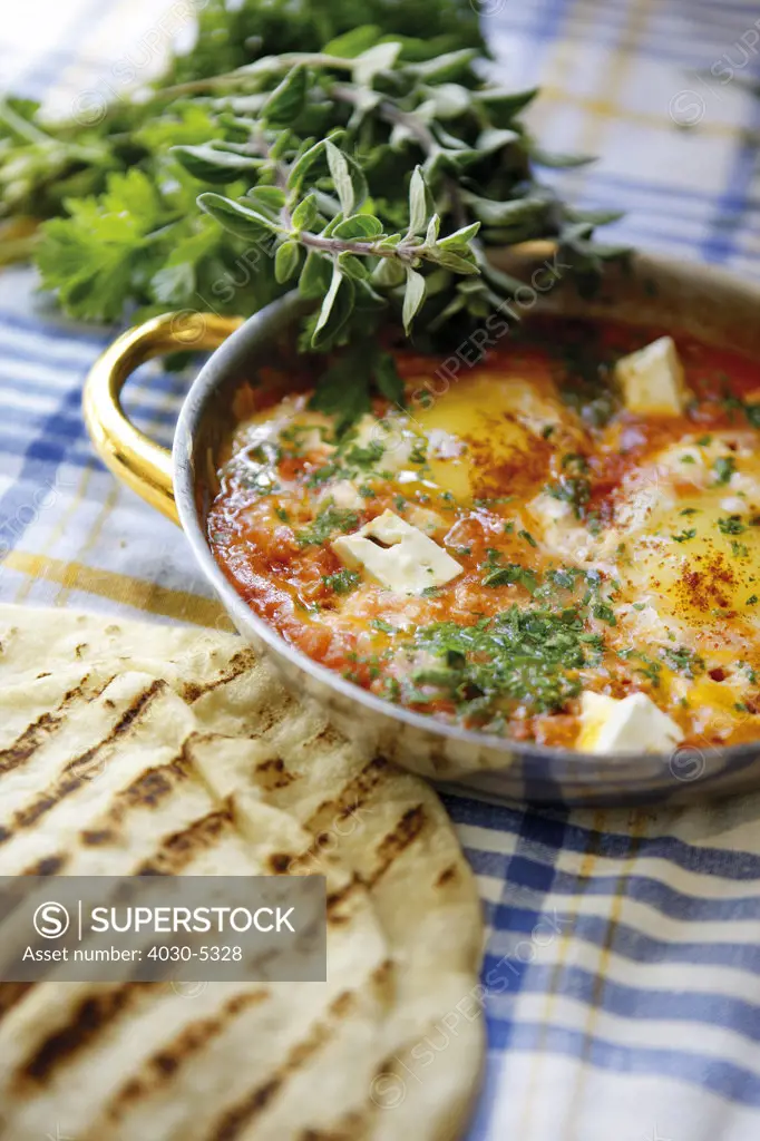 Eggs poached with Tomatoes