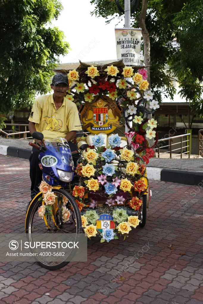 Trishaw Driver, Malacca, Malaysia