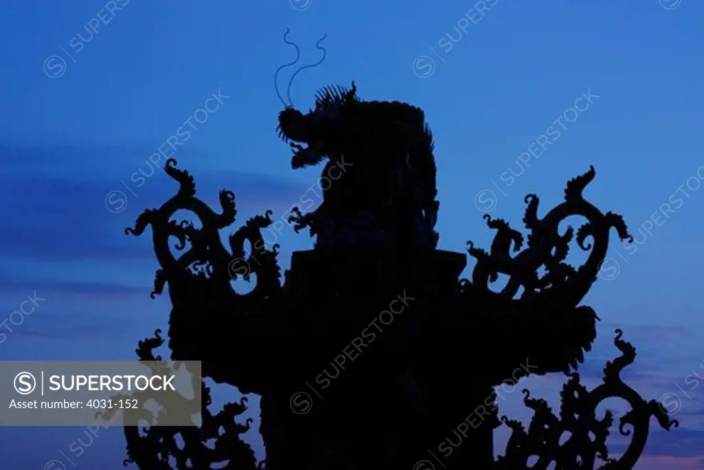 Silhouette of a dragon statue, God of War Temple, Taiwan