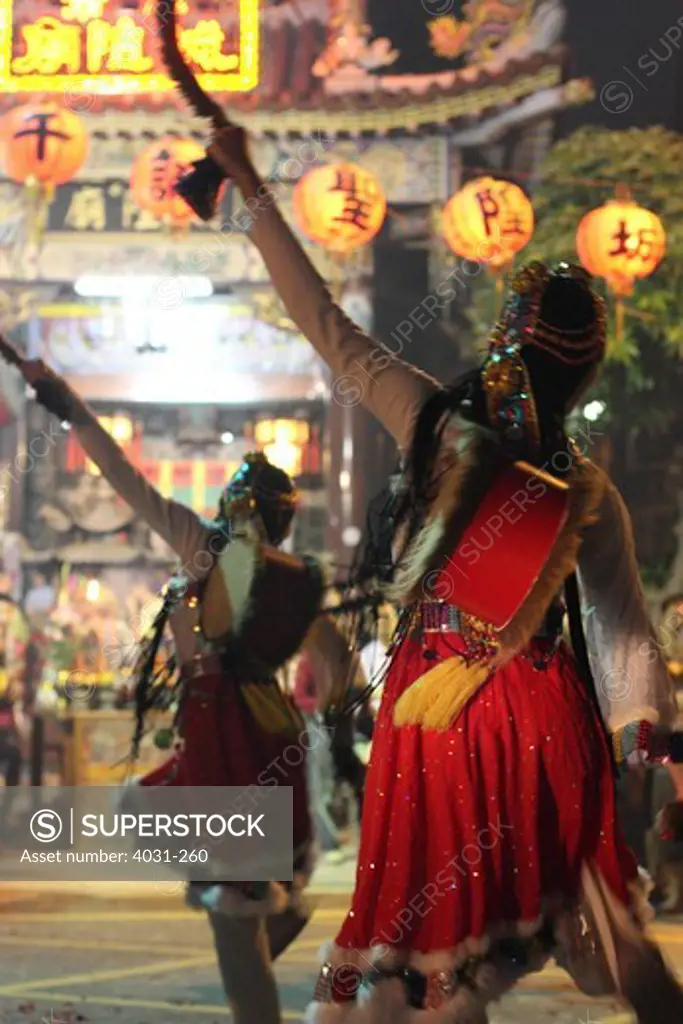 Temple dancers performing during celebration, Tainan, Taiwan