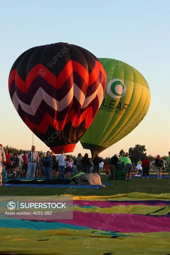 USA, California, Ripon, Spectators watching hot air balloon inflation at Color the Skies Hot Air Balloon Festival