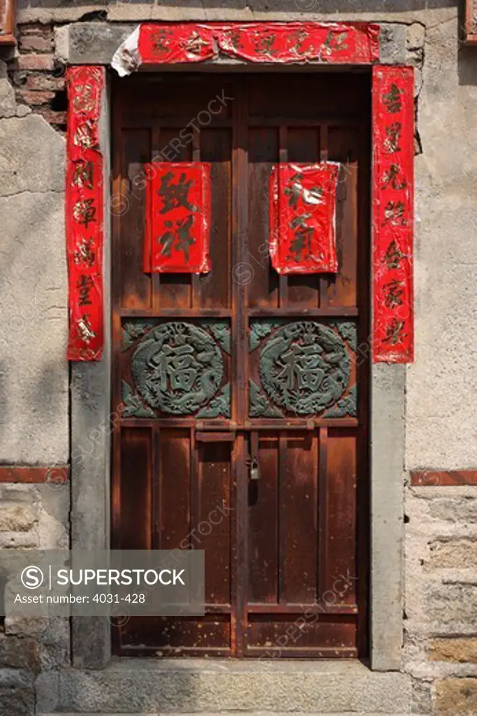 Taiwan, Kinmen County, Front door with Chinese New Year decorations