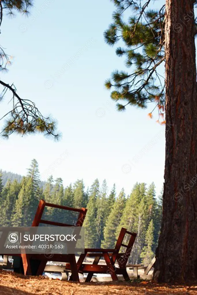 Empty chairs at the lakeside, Pinecrest Lake, Stanislaus National Forest, Tuolumne County, California, USA