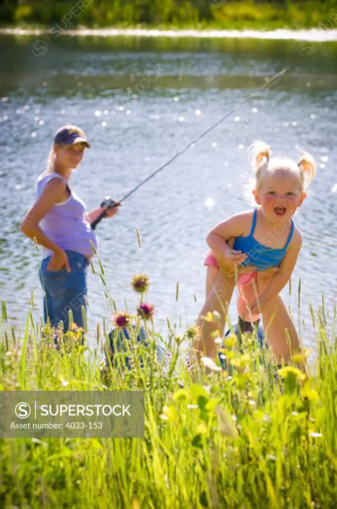 Family fishing in a lake, Bozeman, Gallatin County, Montana, USA