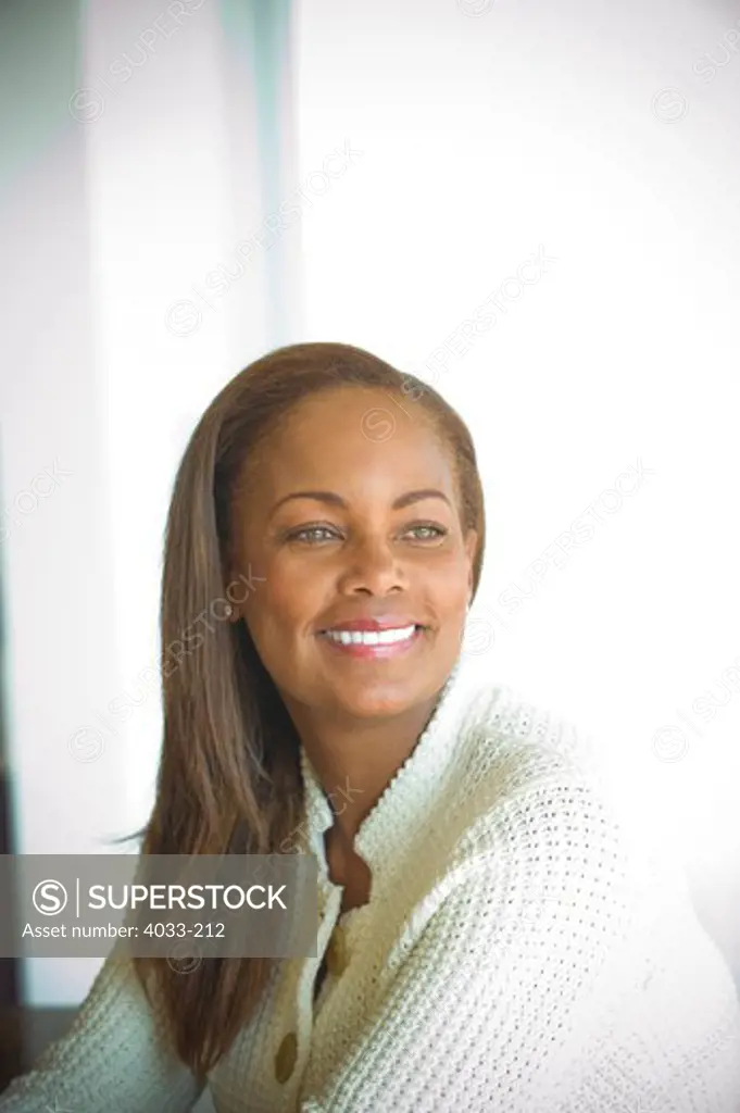 Businesswoman sitting in an office, San Diego, California, USA