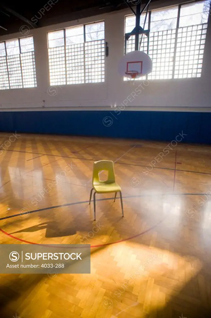 Empty chair in a high school basketball court, Bozeman, Montana, USA