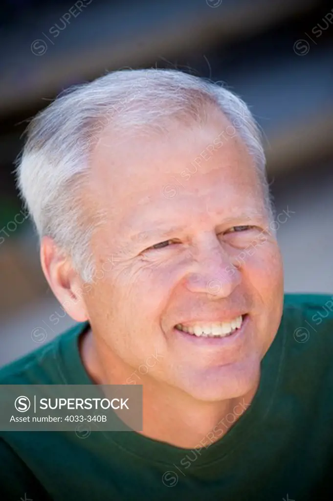 Close-up of a senior man smiling, San Diego, California, USA