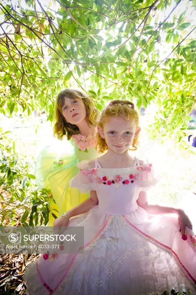 Two girls in fancy dresses, San Diego, California, USA
