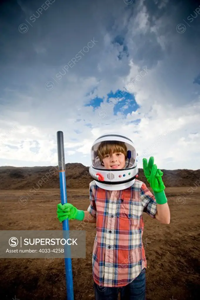 Boy imitating an astronaut