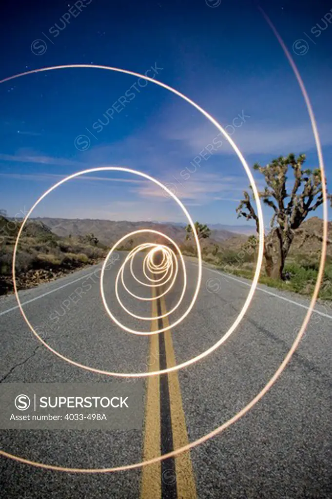 Long exposure of flash light on the road, Joshua Tree National Monument, California, USA