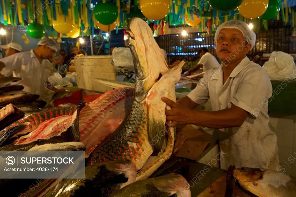 Vendors selling fish at a central market, Manaus, Amazonas, Brazil
