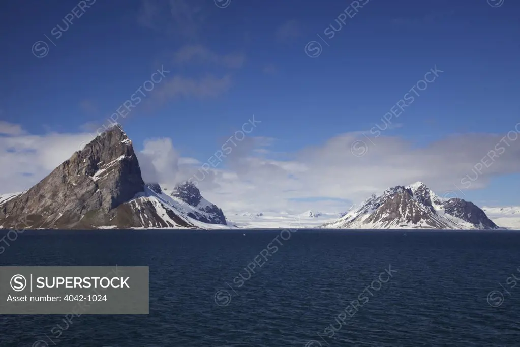 Snow covered mountains with a fjord in summer, Hornsund Fjord, Spitsbergen, Svalbard Islands, Norway