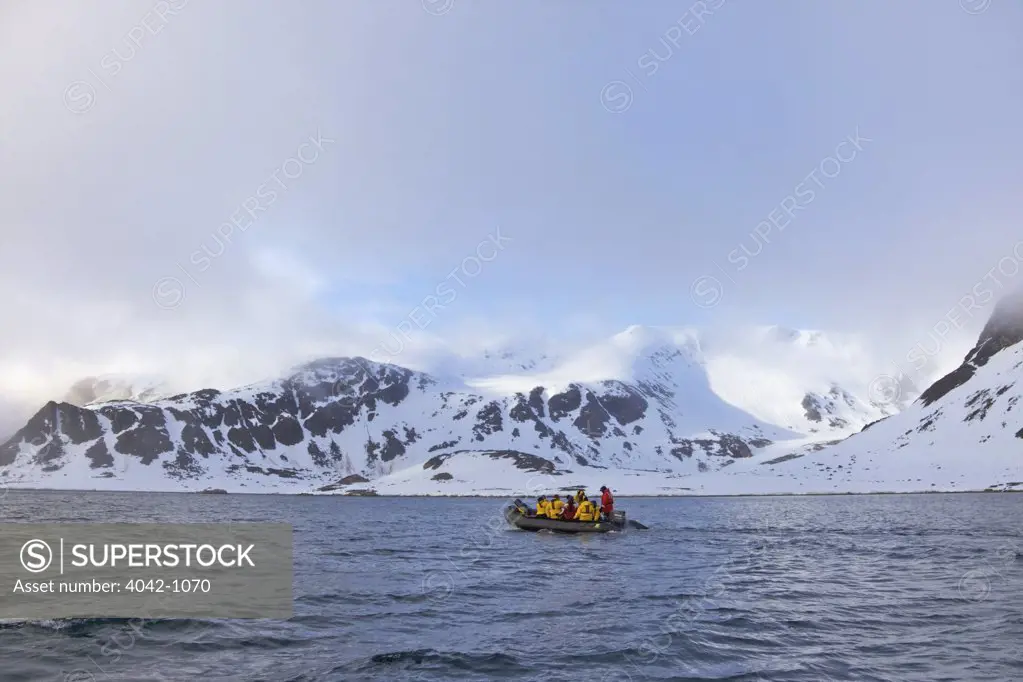 Tourists in zodiac inflatable, Spitsbergen, Svalbard Islands, Norway