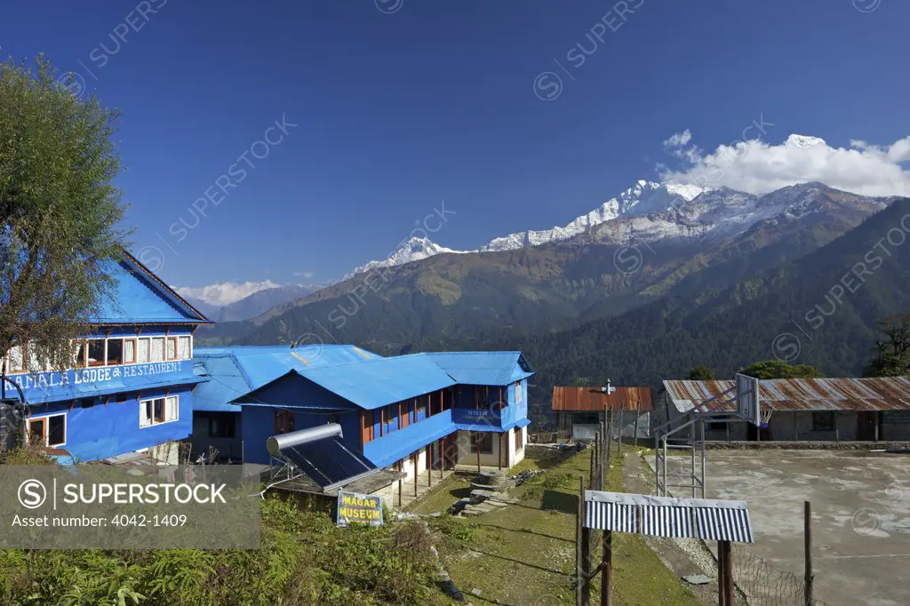 Tea houses in a valley with mountains in the background, Annapurna South, Ghorepani, Annapurna Sanctuary, Himalayas, Nepal