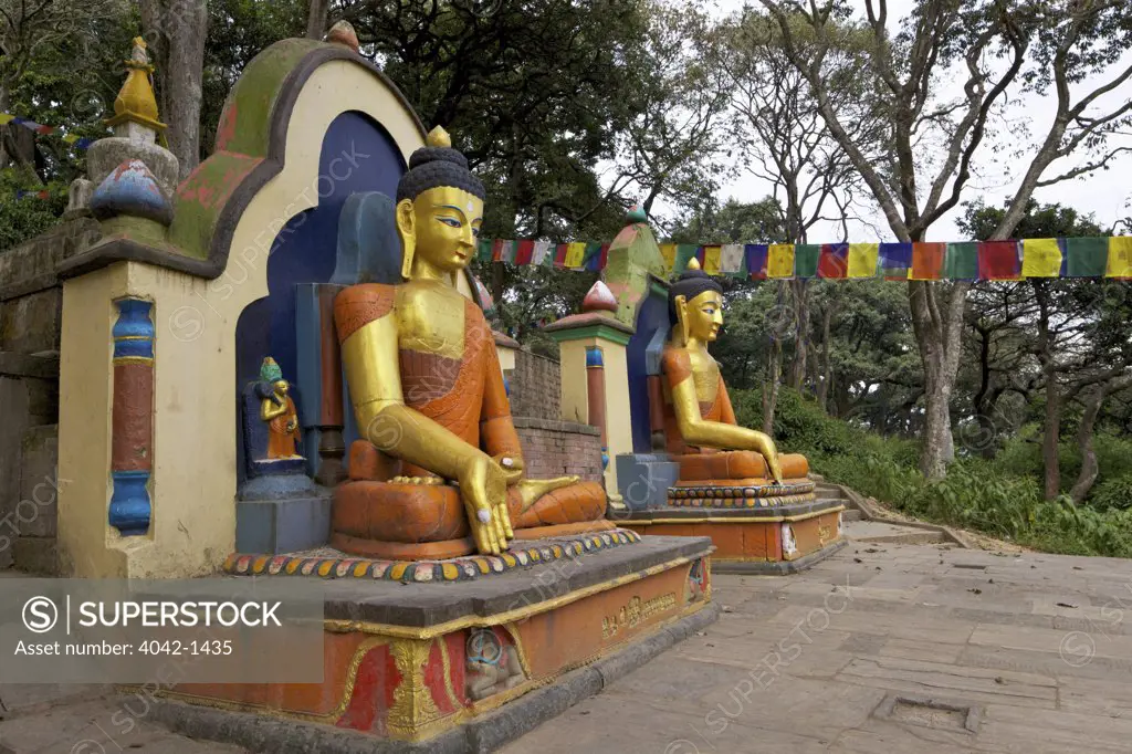 Two seated Buddha statues, Swayambhunath, Kathmandu, Nepal