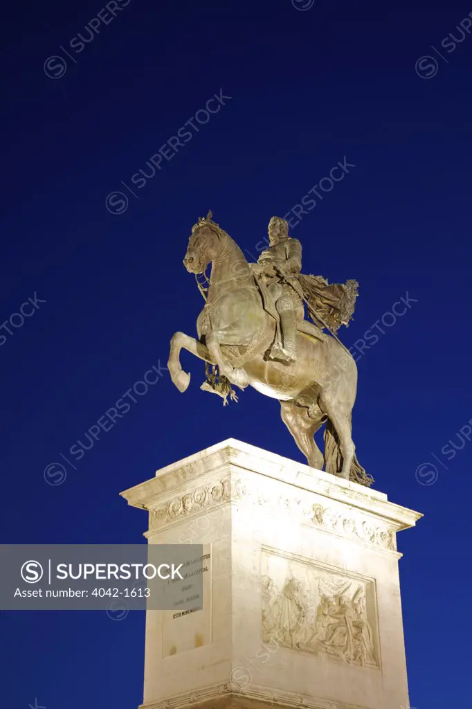 Low angle view of a statue of King Philip IV, Madrid Royal Palace, Plaza De Oriente, Madrid, Spain