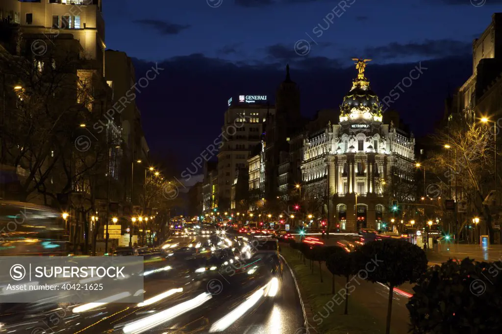 City lit up at night, Metropolis Building, Gran Via, Madrid, Spain