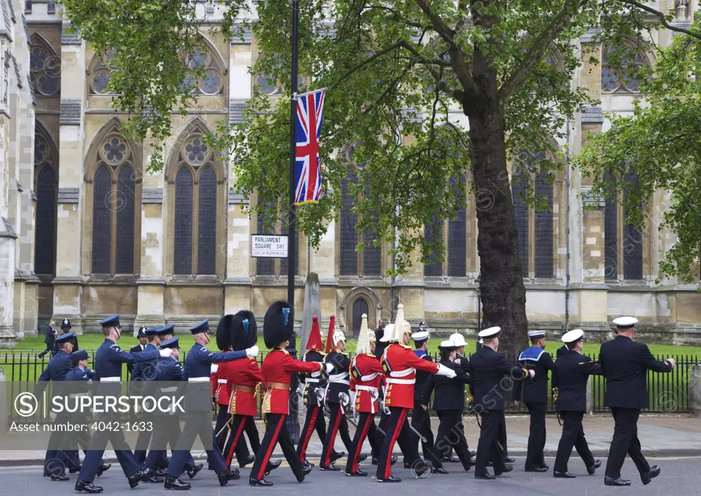 Members of Her Majesty's armed forces marching outside of Westminster Abbey during marriage of Prince William to Kate Middleton on 29th April 2011, London, England