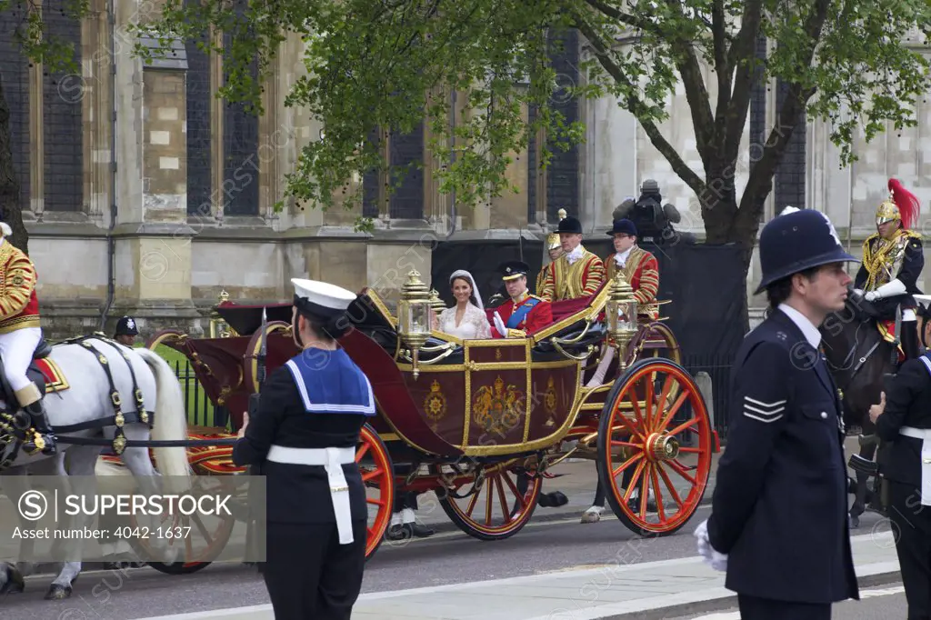 Prince William and Princess Catherine travelling in a 1902 State Landau outside Westminster Abbey on 29th April 2011, London, England