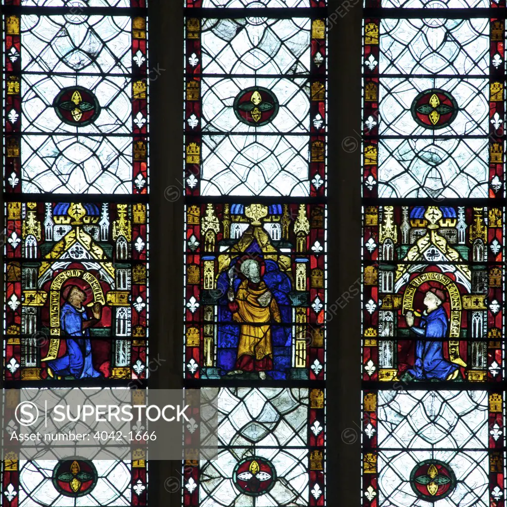 England, Oxfordshire, Oxford, Oxford University, Merton College Chapel, 13th and 14th Century stained glass windows, Saint with kneeling patrons