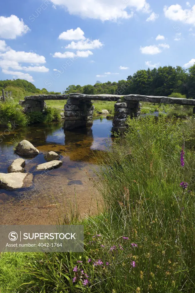 UK, Devon, Dartmoor, Postbridge, Medieval clapper bridge crossing East Dart River