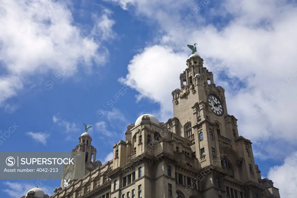 Low angle view of the clock tower of a building, Royal Liver Building, Liverpool, Merseyside, England