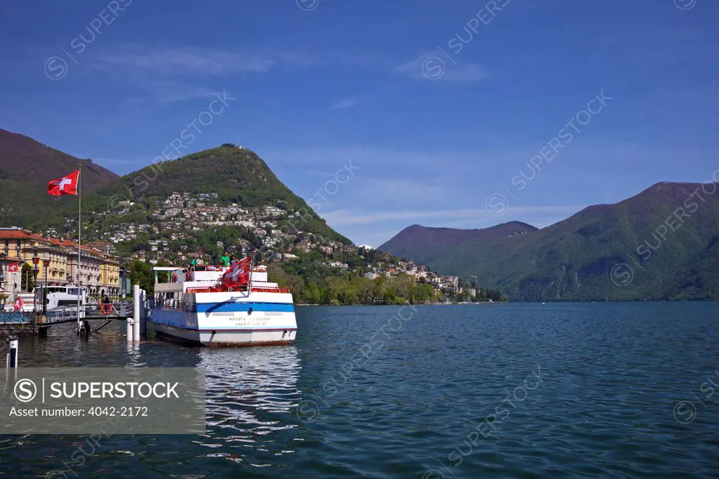 Switzerland, Ticino, Lake Lugano, Pleasure boat in sunshine