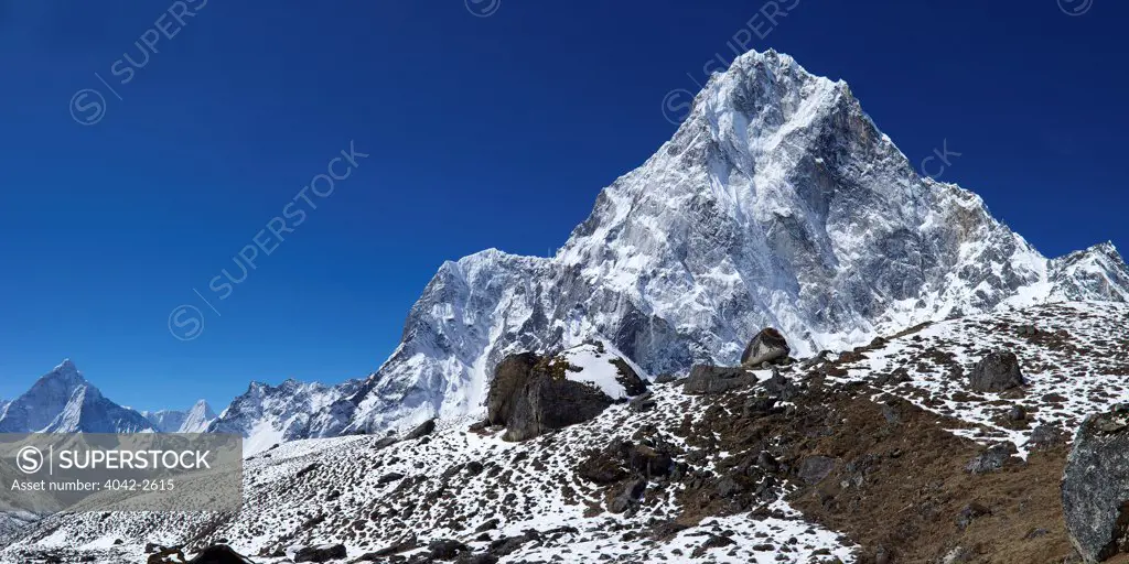 View of Chola Khola valley with Ama Dablam on left and Arakam Tse on right, Solukhumbu District, Nepal