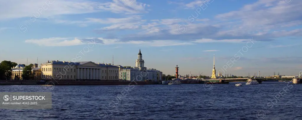 View of St. Petersburg State University and Kunstkammer with Rostral Column and Peter and Paul Fortress from Palace Embankment, St. Petersburg, Russia