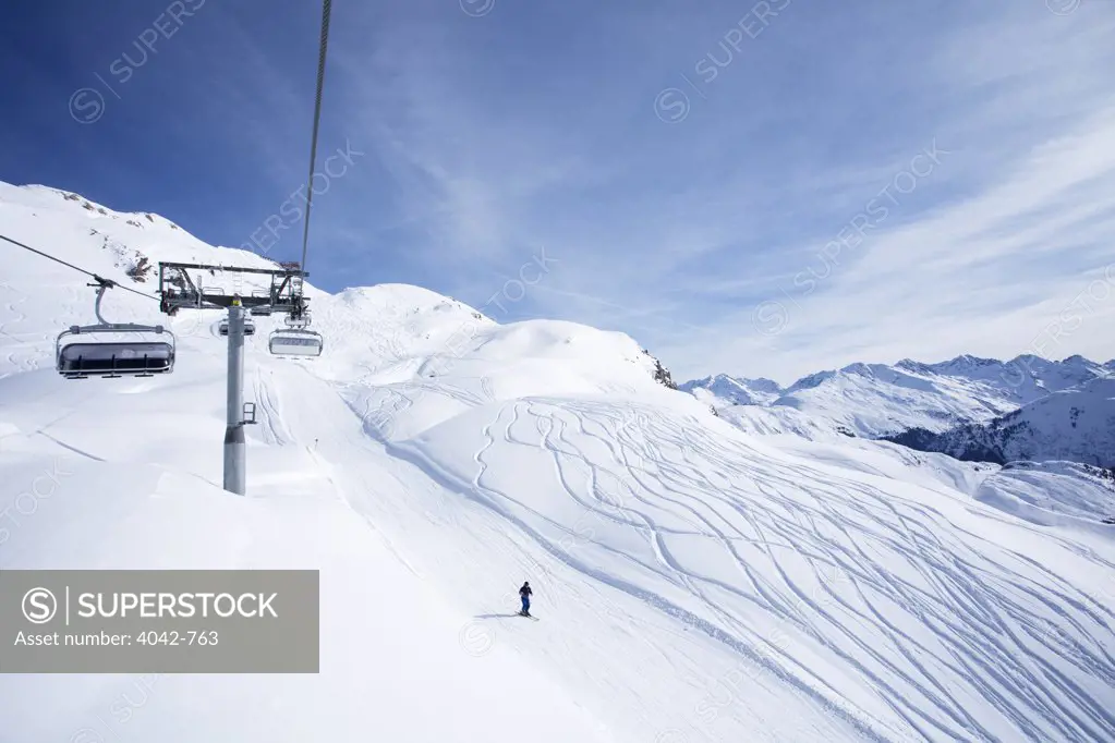 Ski lift over snow covered field, St. Anton Am Arlberg, Tyrol, Austria