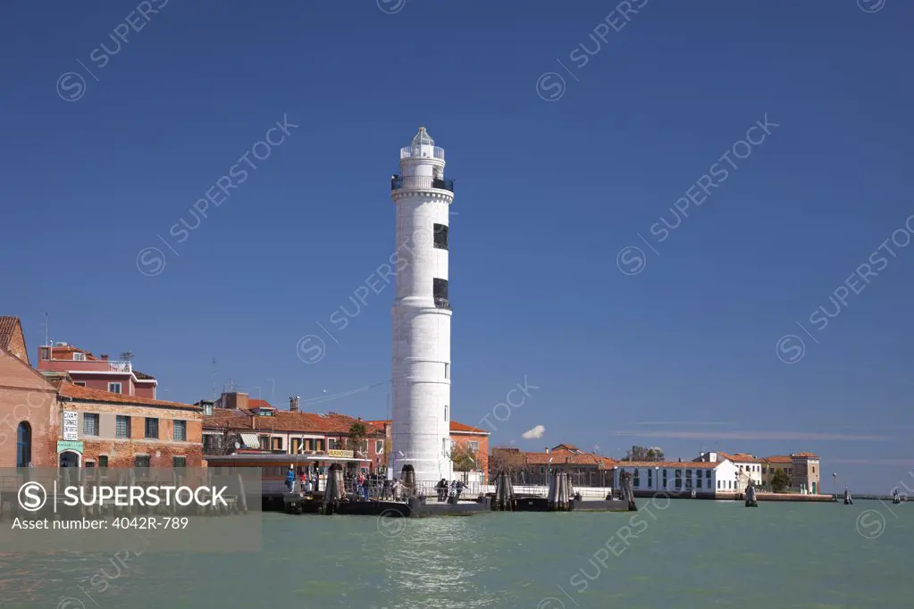 Lighthouse at the waterfront, Murano, Venice, Veneto, Italy