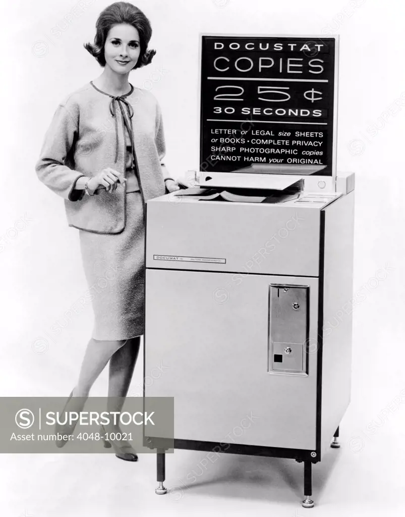 The first public use photocopy vending machine. For 25 cents the DOCUSTAT machine produced copies 30 seconds. Dec. 6, 1963.
