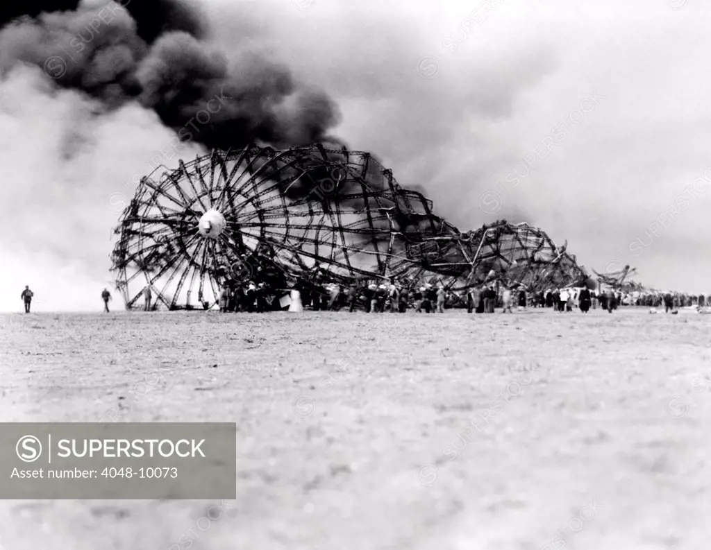 Hindenburg crash at Lake Hurst, New Jersey. The skeleton of the still burning Zeppelin on the ground after bursting in flames while landing. May 6, 1937.