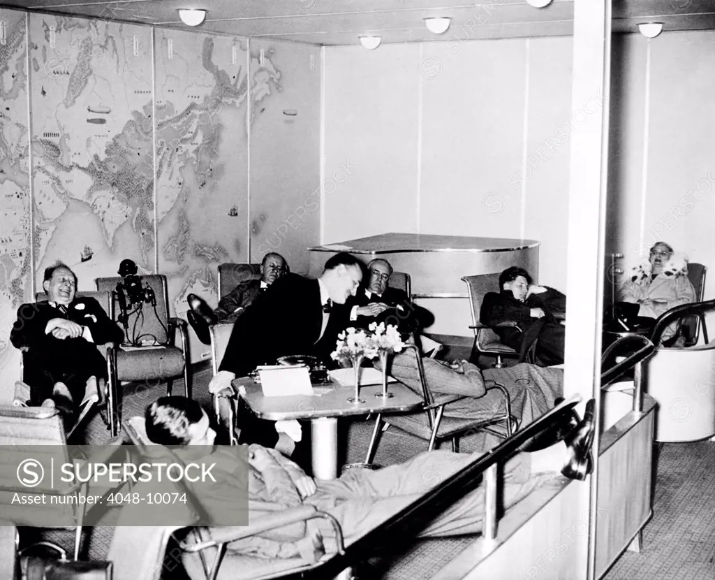 High life on the Hindenburg. Passengers aboard the Hindenburg at ease in the salon as the dirigible flew over the mid-Atlantic, en route to Lakehurst, NJ. May 10, 1936.
