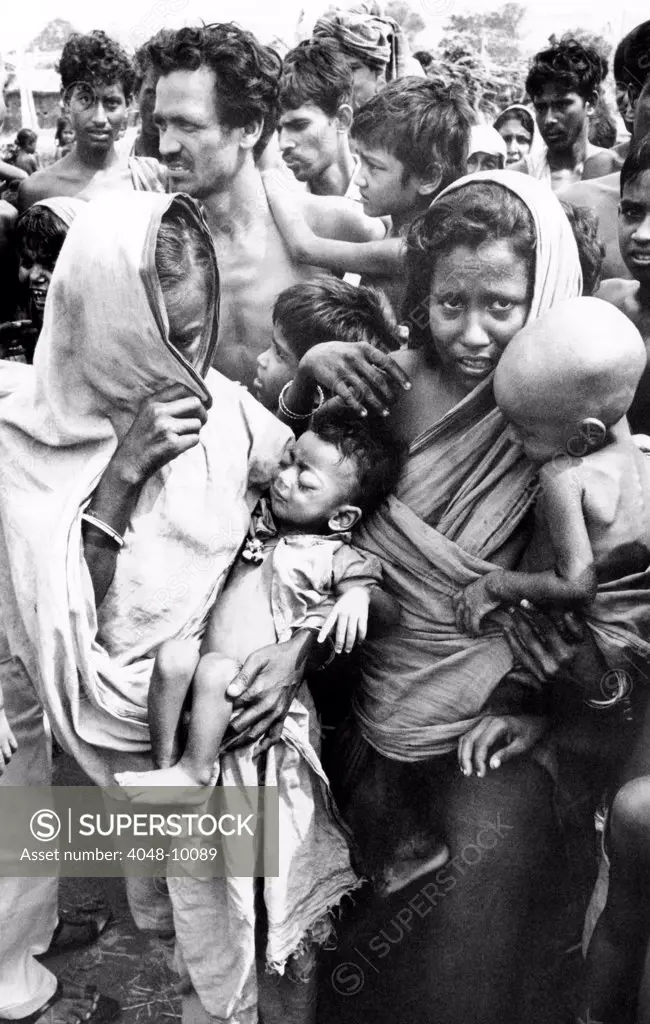 Women and children at the Aherpur Refugee Camp about 45 miles from Calcutta. They are some of the 9.5 million refugees in northeast India during the Bangladesh Liberation War. Nov. 1971.