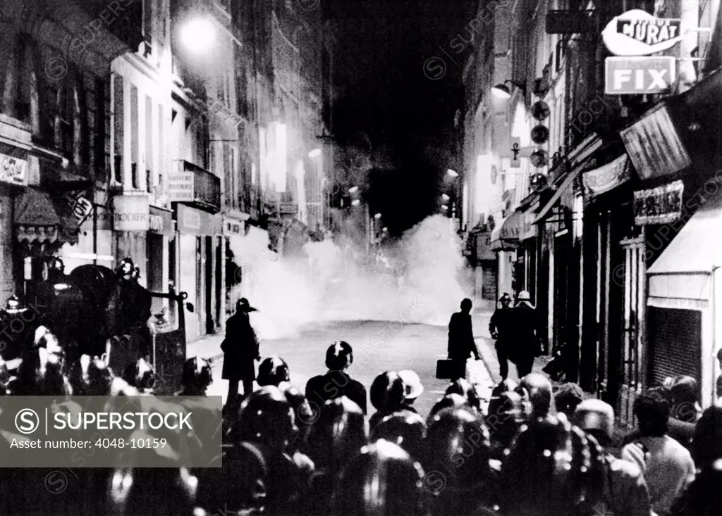 Riot policemen at a burning barricade on the Rue de Seine, a narrow Latin Quarter side street. There was an earlier demonstration of 10,000 students at the Sorbonne University in Paris. June 11-12, 1968