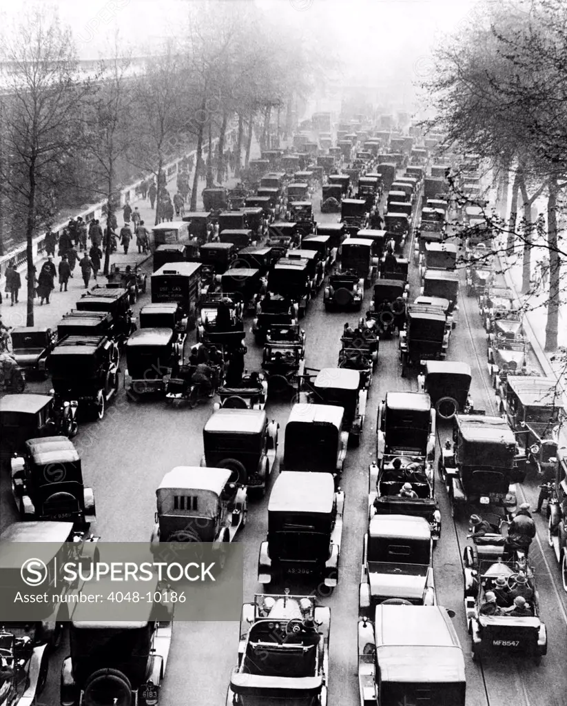 English General Strike. With public transportation workers on strike, Londoner's from the suburbs drove to work, clogging the streets with cars. May 4-13, 1926.