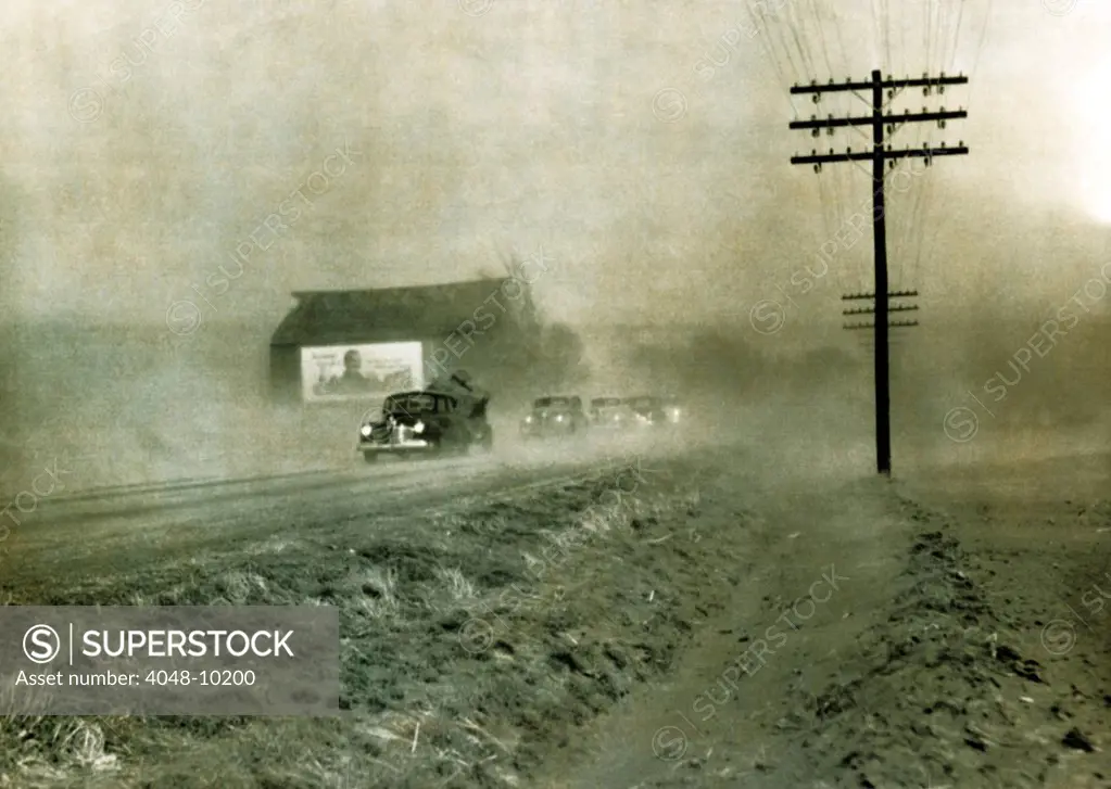 Dust storms near Lawrence Kansas create a hazard for motorists and a disaster for farmers. March 27, 1950.